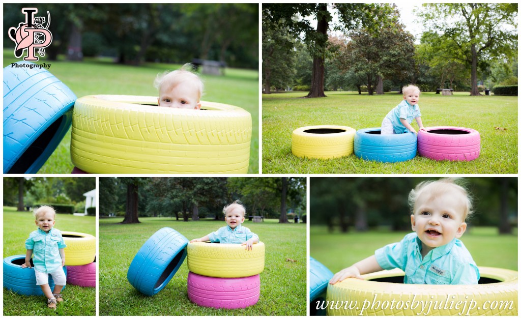 baby boy playing with colorful tires