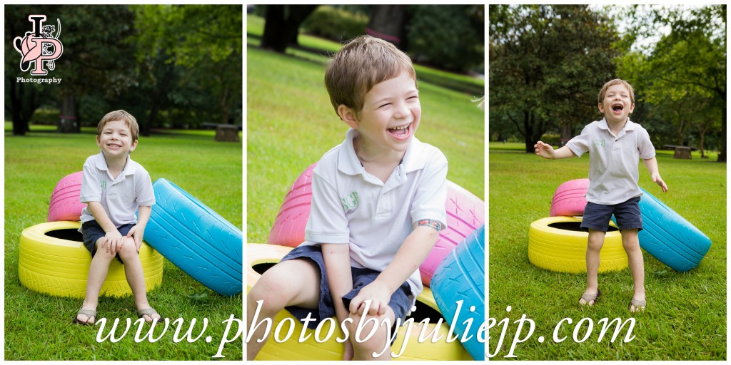 boy playing in colored tires