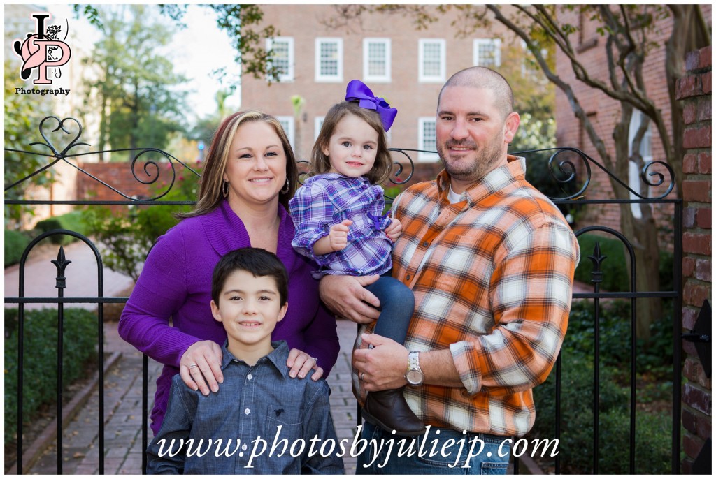 Family portrait in front of gate